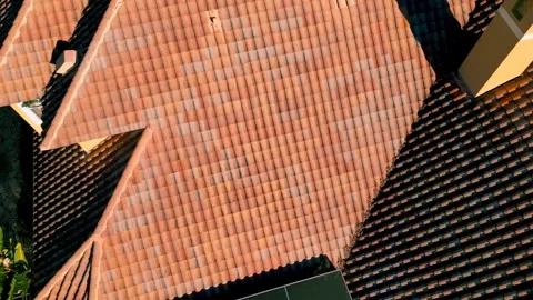 Aerial top down view of red tiled rooftop with clay tiled roof , concept of.. 스톡 동영상 327439819