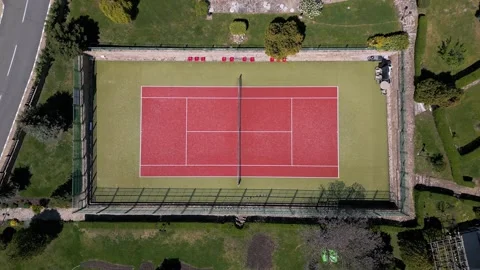 Aerial top down view of a red and green tennis court 動画素材 336956907