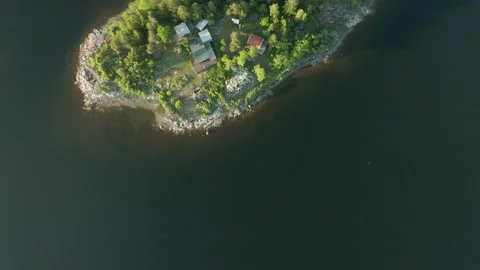 Aerial top down view of remote island in the Swedish archipelago Stock Footage 133866759
