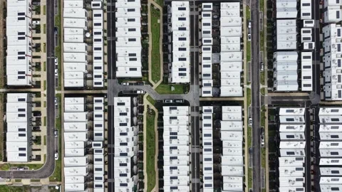 Aerial top down view of residential neighborhood townhouses Video stock 342327284