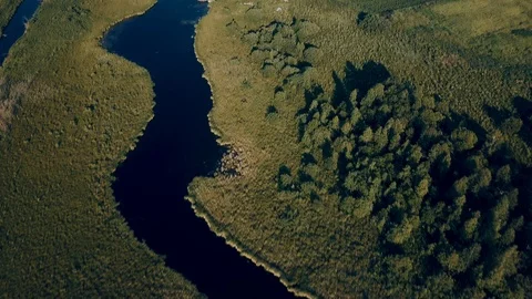 Aerial top down view of river and village on the sides, rural area Stock Footage 93069155