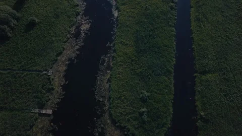 Aerial top down view of river and village on the sides, rural area Video stock 93071223