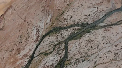 Aerial Top Down View | River flows into nearby Jordan Dead Sea Video stock 141763535