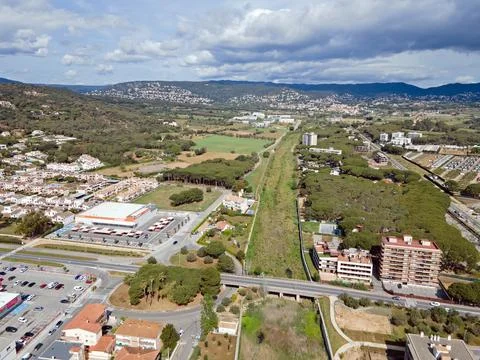 Aerial top down view of river filled with algae bloom in Palamos Catalonia Stock Photos