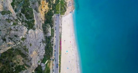 Aerial top down view of road around the sea. Stock Footage 99856640