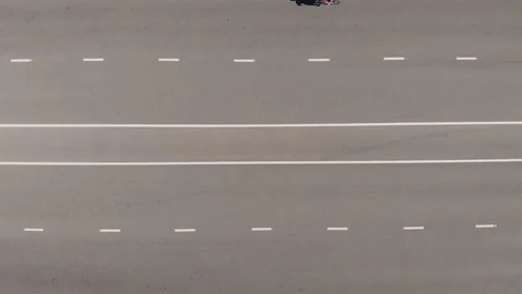 Aerial top down view road cyclist ride at asphalt road Video stock 112014033