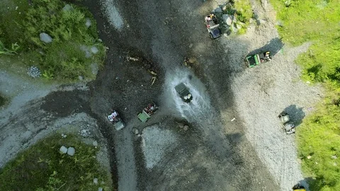 Aerial top down view off road riverside from drone camera flying low down Stock Footage 128076576