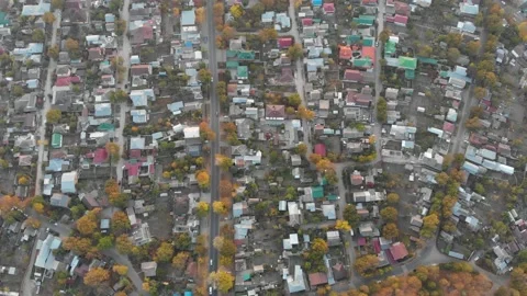 Aerial top down view road with passing cars along countryside and roofs houses Stock-Footage 144249706