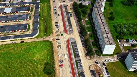 Aerial top-down view of a road intersection in a suburban area with vehicles Video stock 331613723