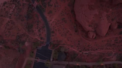 Aerial top down view of a road and red rock cliff in St George Utah USA Stock Footage 333920116