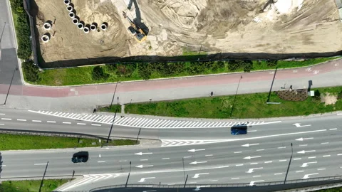 Aerial Top Down View of Road Traffic and Construction Site in Gdynia Video stock 335907544