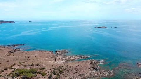 Aerial top down view of rock structures in the Mediterranean Sea in Port Ll.. 스톡 동영상 245931400