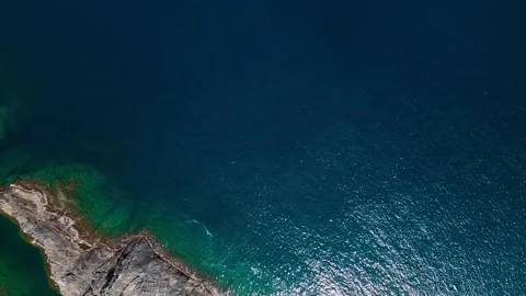 Aerial top down view of rocks in the Mediterranean Sea along Costa Brava Ca.. Stock-Footage 245917266