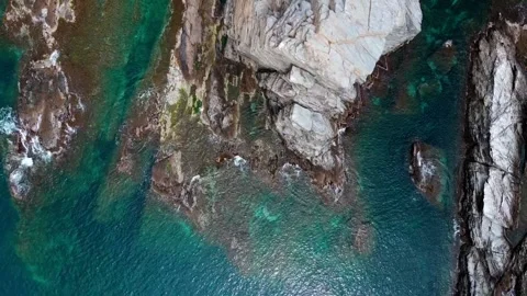 Aerial top down view of rocks in the Mediterranean Sea along Costa Brava Ca.. Stock-Footage 245917482