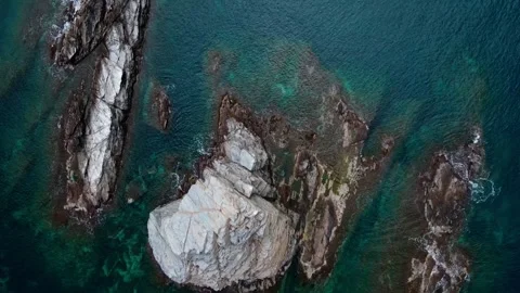 Aerial top down view of rocks in the Mediterranean Sea along Costa Brava Ca.. Stock-Footage 245917518
