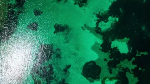 Aerial top down view of rocks in the Mediterranean Sea in Port Lligat Costa.. Stock-Footage 245931581