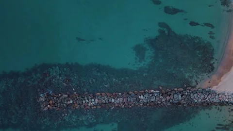 Aerial top down view of rocks in the Mediterranean Sea near Palamos beach C.. 스톡 동영상 246303721