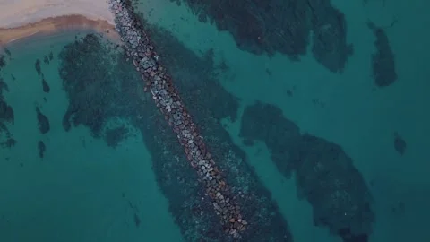 Aerial top down view of rocks in the Mediterranean Sea near Palamos beach C.. 스톡 동영상 246303733