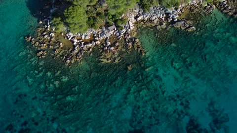 Aerial top down view of a rocky croatian coastline Stockbeeldmateriaal 340182308