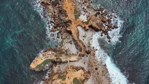 Aerial Top-Down View of a Rocky Coastal Peninsula in Portugal Stock-Footage 345841898