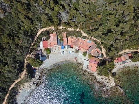 Aerial top down view of roofs on beach on sunny summer day Costa Brava in C.. Stock Photos