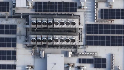 Aerial top down view of rooftop solar panels and hvac system Stock Footage 328896850