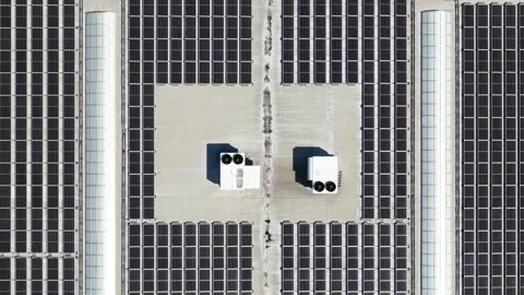 Aerial top down view of rooftop solar panel farm Stock-Footage 335691171