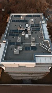 Aerial top-down view of rooftop with solar panels, Poznań, Poland, 21.12.2025 Stock Photos