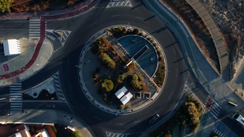 Aerial Top Down View of Roundabout Traffic near Beach Stock Footage 344529354