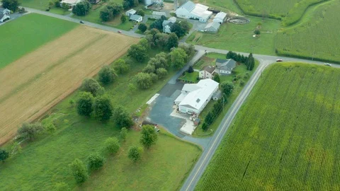 Aerial Top Down View of Rural Farmland in PA with Barns, Silos and Corn Fields Stock Footage 116011379