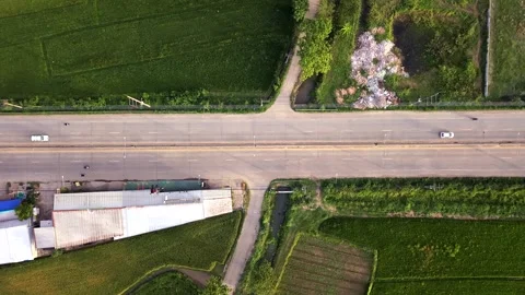 Aerial top down view of rural highway with moving traffic Stock Footage 335129441