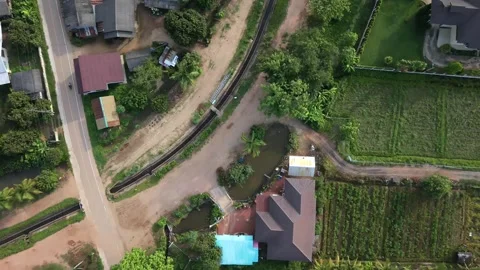 Aerial top down view of rural village and agricultural patterns in Asia 스톡 동영상 335185856