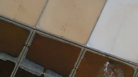 Aerial top down view of salt ponds in Trapani Sicily in Italy 4k Stock Footage 83242038