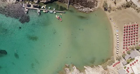 Aerial Top-Down View of Sandy Beach with Umbrellas and Turquoise Waters, Paros Stock Footage 291728132