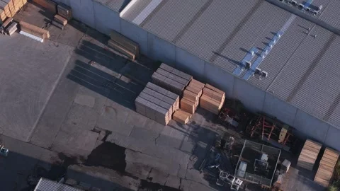 Aerial top down view of a sawmill backyard with stacked lumber 库存影片 346361405
