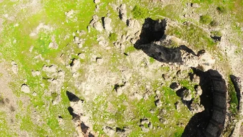 Aerial top down view scenic round Bana cathedral wall ruins . Famous georgian Stock Footage 191906591