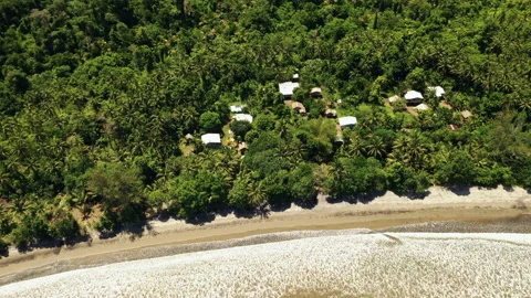 Aerial top down view of a seaside coastal village and landscape. Stock Footage 162999159