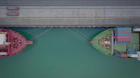 Aerial: Top down view of a ship at port Stock-Footage 167033339