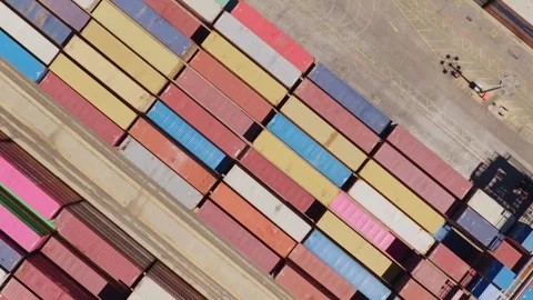 Aerial top down view of shipping containers in a port terminal Stock Footage 336688096