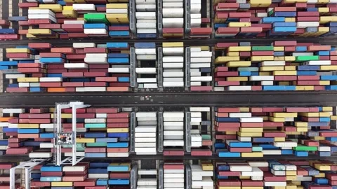 Aerial top down view of shipping containers in an industrial port Stock-Footage 337811373