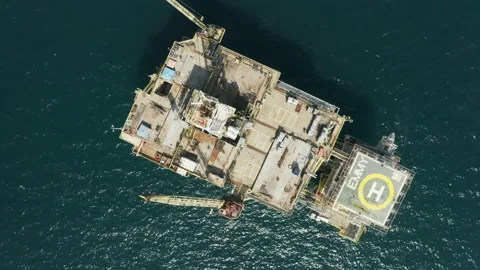 Aerial top down view of off shore Industrial Oil Rig production drill platform Stock Footage 163245885