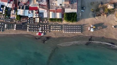 Aerial top down view of Sidari Beach in Corfu Greece showing golden sand rows Stock Footage 341389391