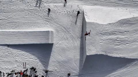 Aerial top down view of skier jump on snowy ramp, Dolni Morava winter Stock Footage 265853817