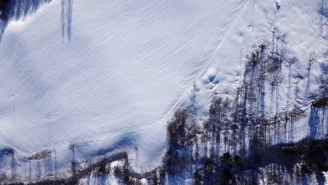 Aerial top down view on snowy highway e18 and houses covered with snow in Norway Stock Footage 86285889
