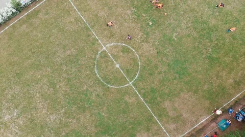 Aerial Top Down View of Soccer Field. Non-professional (Amateur) football match Video stock 110795407