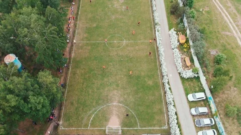Aerial Top Down View of Soccer Field. Non-professional (Amateur) football match Stock Footage 110797866