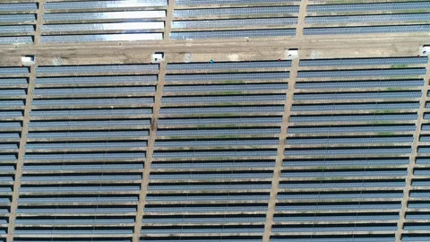 Aerial top down view of solar power station field at sunny day. Aerial Top View Stock Footage 129968793