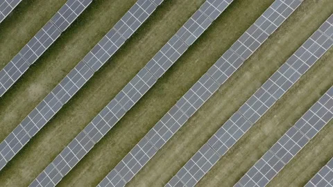 Aerial top down view of solar power station. Drone flies over solar panels farm Stock Footage 136387918