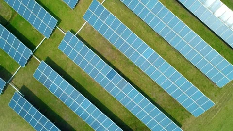 Aerial top down view of Solar Panels Farm (solar cell) with sunlight. Production Stock Footage 136809764
