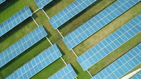 Aerial top down view of Solar Panels Farm (solar cell) with sunlight. Production Stock Footage 136813257